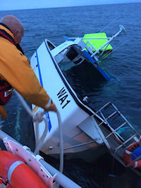 Barrow RNLI rescue three men from sinking fishing vessel